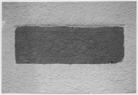 Sundby kyrka, den i sakristians mur insatta gravhällen från omkring år 1050