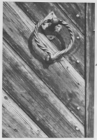 Stora Kvek, portkläpp i konstsmide